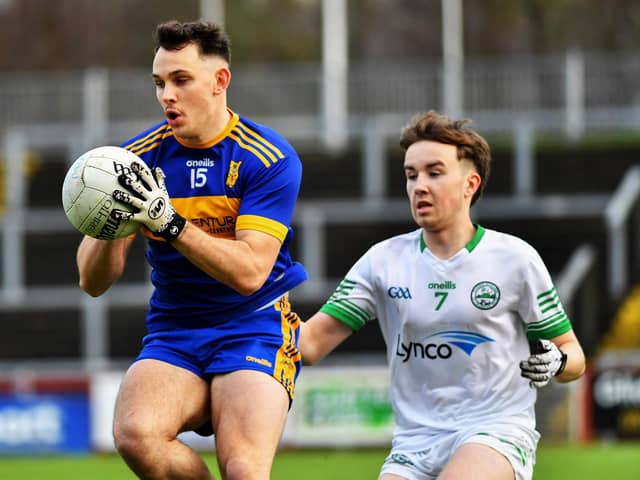Noamh Padraig's Caolan McColgan shields the ball from Craigbane's James McLaughlin during Saturday's final. Photo: George Sweeney