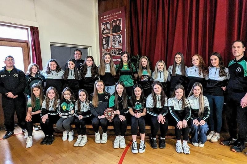The young camogie players, pictured with club coaches, show off their awards at the 2023 annual presentation night.