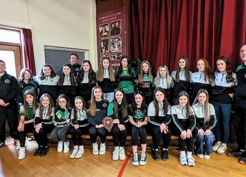 The young camogie players, pictured with club coaches, show off their awards at the 2023 annual presentation night.