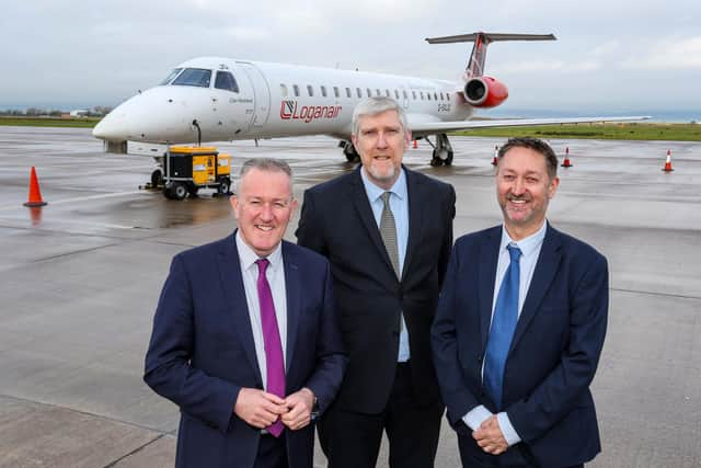 Economy Minister Conor Murphy and Infrastructure Minister  John O’Dowd with  Steve Frazer, Managing Director, City of Derry Airport, at the announcement of funding to protect the continuation of flights from the airport to London Heathrow. Credit Lorcan Doherty