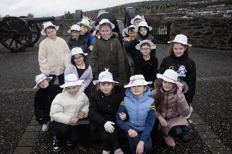 Pupils from Gaelscoil Eadain Mhoir pictured before taking part in Feile Derry's Easter Bonnet Parade on Tuesday.