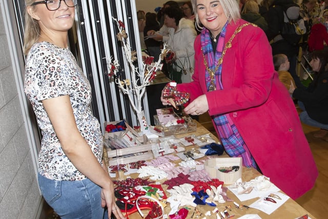 Mayor, Sandra Duffy checking out the wares at Sandra Smith’s stall on Saturday at St Mary’s College.