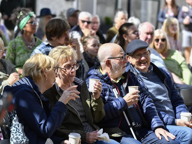 Revellers enjoy the Dougie Breslin Band performance, in the Craft Village, afternoon. Photo: George Sweeney