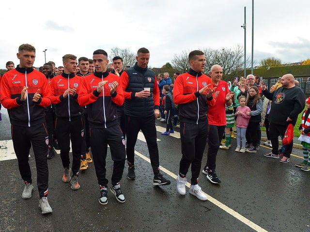 Derry City players and staff greet fans gathered at Brandywell Stadium on Saturday morning prior to their departure for Dublin ahead of tomorrow’s FAI Cup Final against Shelbourne. George Sweeney. DER2244GS – 46