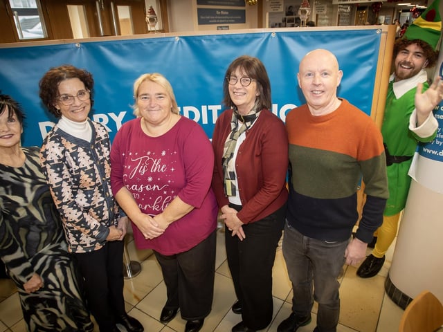 Derry Credit Union retirees Joan Gallagher, CEO and Mary Crumley, Education and Training Officer pictured on Santa Saturday with from left, Patricia Doherty, Delma Boggs, President and Michael Gallagher. : .
