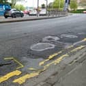 Road defects on the Strand Road on May 3, 2024.