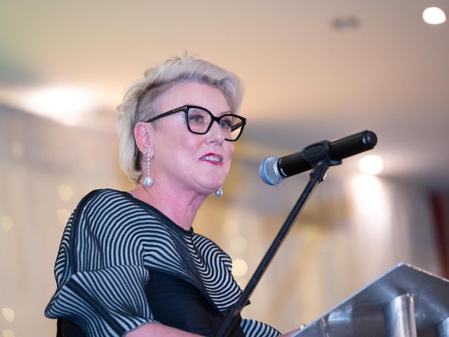 Moya Doherty, born in the border village of Pettigo, was the commissioning producer and originator of the global phenomenon Riverdance and is currently Chair of the RTE board. 

Moya Doherty speaking at the Tip O’Neill Irish Diaspora Awards 2022 hosted by the Donegal County Council in The Inishowen Gateway Hotel. Photo Clive Wasson
