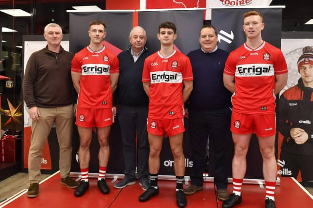 John Tumilty, O'Neill's Sportswear, John Keenan, chairperson Derry GAA, and Cormac McCloskey, Co-Owner and Director at Errigal Contracts Ltd, pictured with county players John Mullan, Patrick McGurk and Marty Bradley at the launch of Derry's new home and away jersey, for the 2026/2027 season, at O'Neill's sports store in Waterloo Place on Thursday evening. Photo: George Sweeney