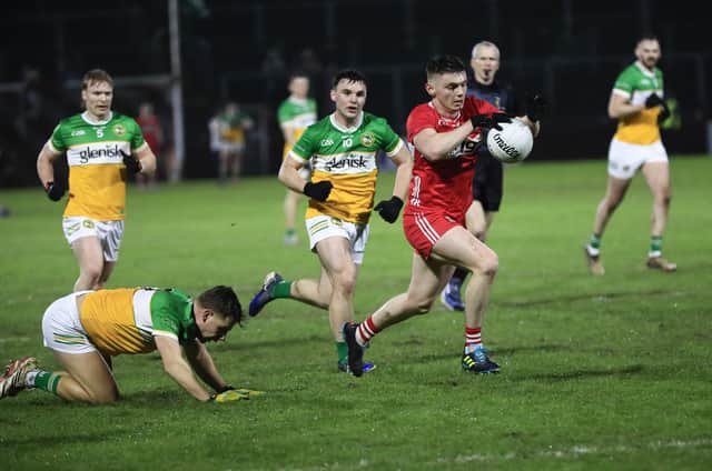 Matthew Downey leaves Offaly players in his wake on his way to scoring his first goal for Derry in Saturday's victory over Offaly. (Photo - Tom Heaney, nwpresspics)