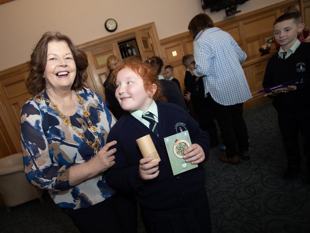 'Thank you Madam Mayor' from Long Tower pupil Lizzie-Mae after she receives a momento of her visit to the Guildhall on Thursday.