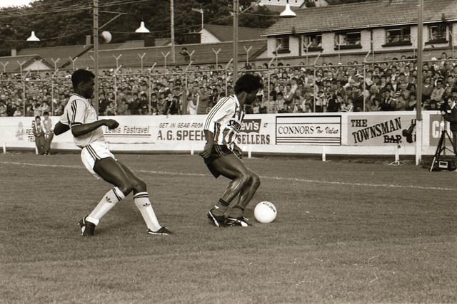 Nelson Da Silva shields the ball from Paul Davis.