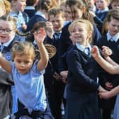 Children at Rosemount Primary School dance to the music and song of the Jive Aces on Thursday morning. Photo: George Sweeney
