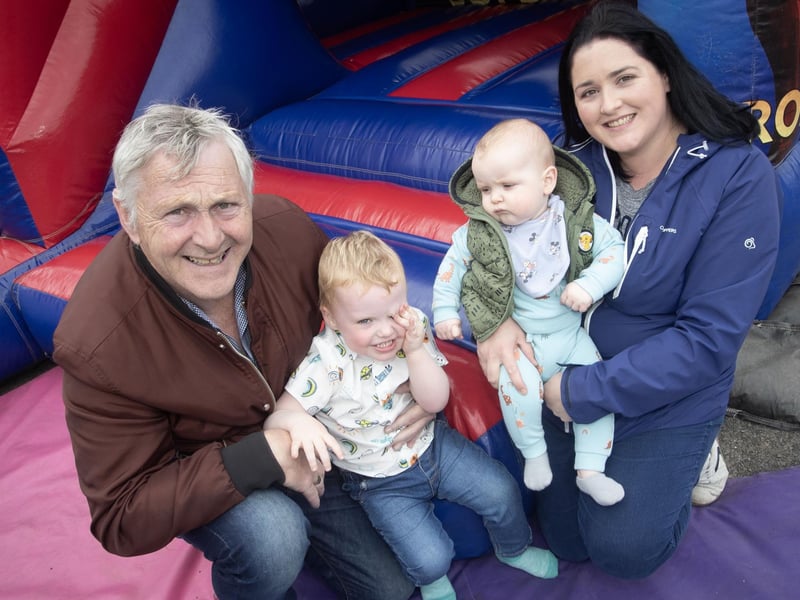 THREE GENERATIONS. . . Pictured at the Destined BBQ and Fun Day on Tuesday are grandad Martin McLaughlin with daughter Josephine McNamee and her sons Danny (2) and Oisin (18 months). (Photos: Jim McCafferty Photography)