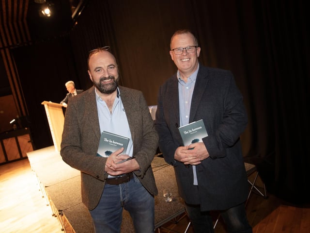 'The In-between' author and poet Feargal Friel pictured with lifelong school friend and author Brian McGilloway at Thursday night's launch.