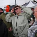 (Left to right) Mo Chara (Liam Óg Ó hAnnaidh),  DJ Próvaí (J. J. Ó Dochartaigh) and Móglaí Bap (Naoise Ó Cairealláin ) from the band Kneecap at the Garvaghy Road to show support for the Garvaghy Road residents amid the Drumcree parade dispute. Brian Lawless/PA Wire