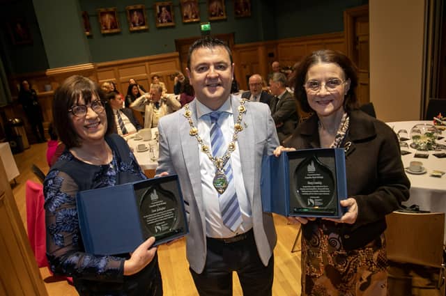 The Mayor of Derry City and Strabane District Council, Ruairi McHugh making a special presentation to retiring Derry Credit Union officers, Joan Gallagher and Mary Crumley at the Guildhall on Tuesday evening. (Photos: Jim McCafferty Photography)