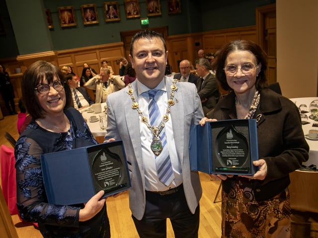 The Mayor of Derry City and Strabane District Council, Ruairi McHugh making a special presentation to retiring Derry Credit Union officers, Joan Gallagher and Mary Crumley at the Guildhall on Tuesday evening. (Photos: Jim McCafferty Photography)