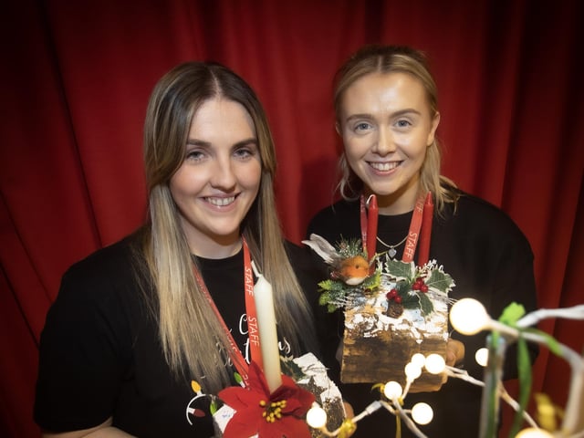 CHRISTMAS LOGS. . . .Stallholders Aimee Black and Molly Reid show off their Christmas logs at Holy Child PS on Thursday. (Photos: Jim McCafferty Photography)