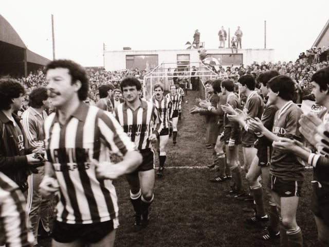 Players, club officials and staff and fans as Derry City FC face Finn Harps FC at Ballybofey in their first league meeting.
