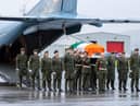 The remains of Private Sean Rooney arriving at Casement Aerodrome.