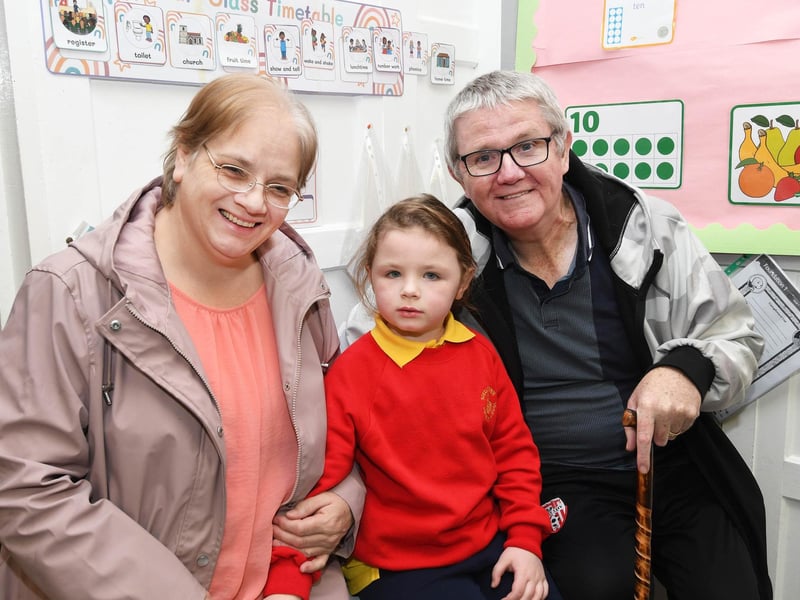 Primary 1 pupil Daisy Rose pictured with her grannies.