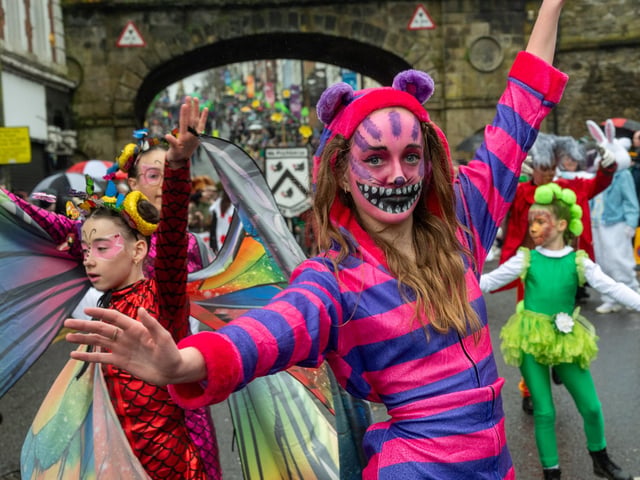 The annual St. Patrick’s Day Spring Carnival took to the streets of Derry on Tuesday as the annual celebration brought entertainers into the city centre before a parade watched by thousands made its way down Shipquay Street past the historic Guildhall. Picture Martin McKeown. 17.03.26