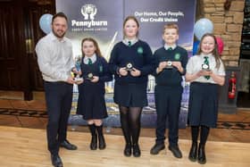 Winners of Competition A - St. Patrick's PS Shamrock Superstars (L to R - Frank Doherty (Pennyburn CU CEO), Aine, Aiyana, Darragh and Anna)