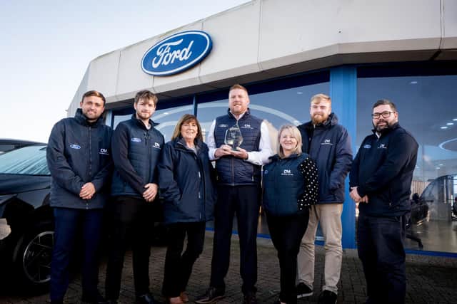 Jonathan Ferguson, Ford Sales Manager at Desmond Motors, pictured with the Ford Building Together Award at Desmond Motors’ Strand Road dealership in Derry following the dealership’s success at the 2026 Ford Dealer Marketing Awards.