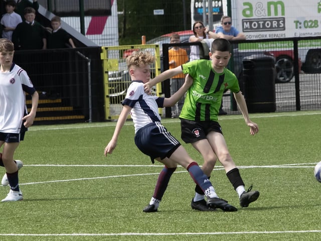 St. Joseph's striker Liam Gallagher storms away from his markers during Thursday's final.