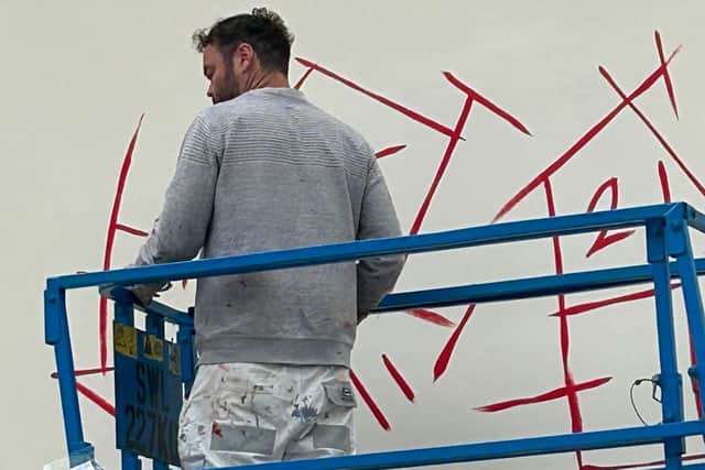 Fintan Magee at work