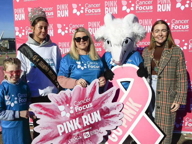 Mayor Grace Uí Niallais with the Cancer Focus mascot at the Cancer Focus NI Pink Run held in Ebrington Square, on Sunday. Included from left, are Katie, Brooke Hutcheon, and Ruth. (Photo - Tom Heaney, nwpresspics)