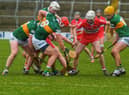 Derry and Kerry players battle for possession of the sliothar in Celtic Park. (Photo: George Sweeney).