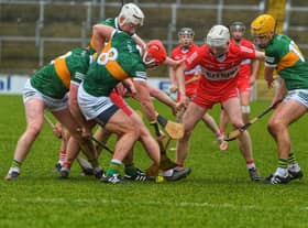 Derry and Kerry players battle for possession of the sliothar in Celtic Park. (Photo: George Sweeney).