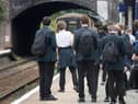 Schoolchildren awaiting the arrival of a Northern service.