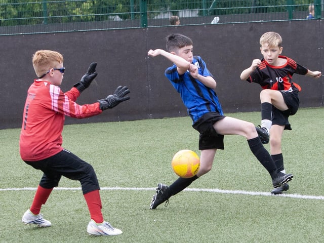 Action from one of the group games between Oxford United and Phoenix Athletic. (Photos: Jim McCafferty Photography)