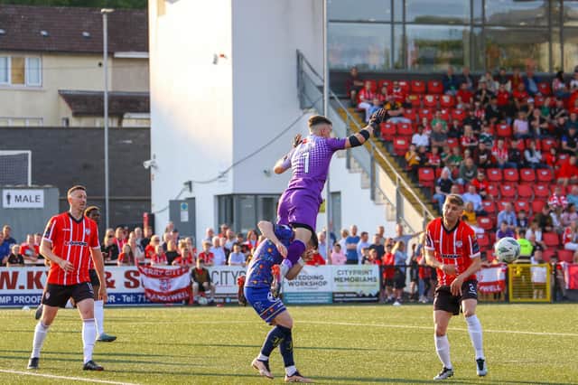 Derry City goalkeeper Brian Maher comes to claim the ball under pressure from a Bohs attacker in the first half. Photographs by Kevin Moore.