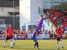 Derry City goalkeeper Brian Maher comes to claim the ball under pressure from a Bohs attacker in the first half. Photographs by Kevin Moore.