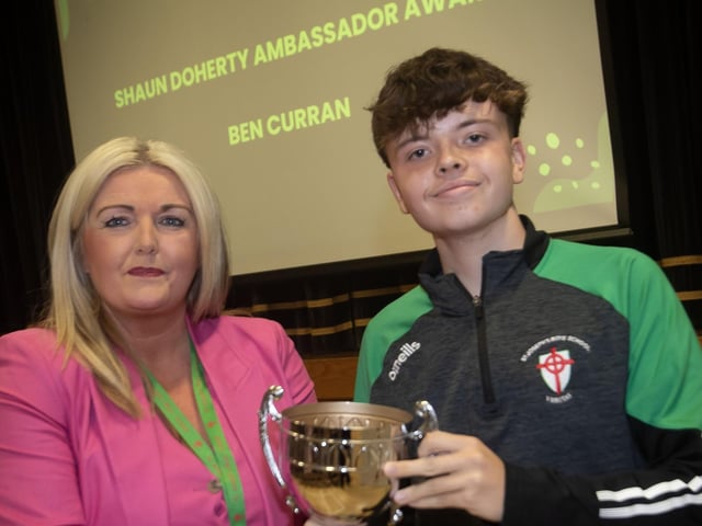 Mrs Ciara Deane presenting the Shaun Doherty Ambassador Award to Ben Curran. : .