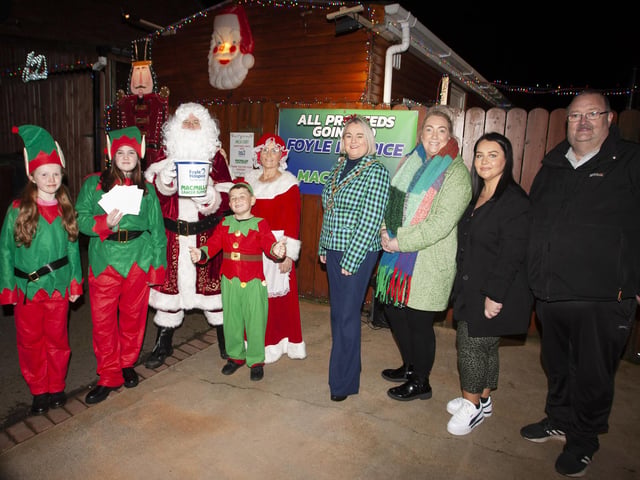 The Mayor of Derry City and Strabane District Council, Sandra Duffy pictured at the Amelia Court Christmas Lights Switch-On on Thursday night last. Included on left are Santa Claus, Mrs. Claus and their elves and, on right, Ailbhe McDaid, Fundraiser, Foyle Hospice, Michaela Harkin and Martin Carr, residents, Amelia Court. All monies raised are gong to the Foyle Hospice and MacMillan. (Photos: Jim McCafferty Photography)