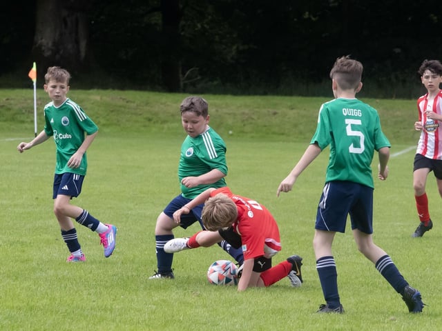 Action from Lisnaskea versus Loughgall. (Photo: Jim McCafferty Photography)