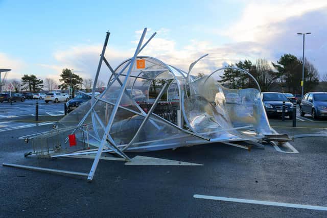 Trolley bays at Sainsburys damaged by Storm Isha. Photo: George Sweeney