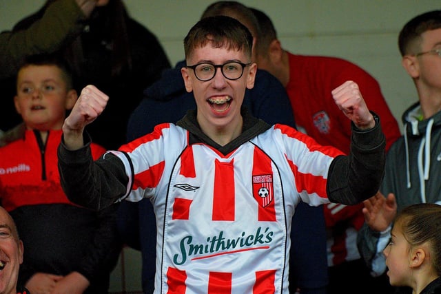 Derry City fan in his retro shirt celebrates his side's FAI Cup semi-final victory over Treaty United. Picture by George Sweeney. DER2241GS – 034