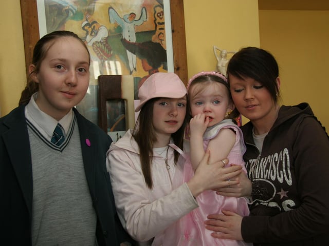 Birthday girl Orlaigh poses for the photographer with sisters, Caoimhe, Christine and Tara 0030JML : Parties and celebrations April 2006: Orlaigh Kelly.