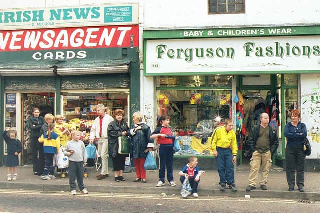 Queue for Black Taxi service in William Street, Derry.
