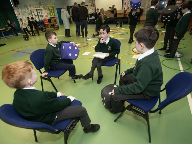 Primary 5 pupils taking part in one of the maths workshops on Monday last. Fromleft Oran, Blake, Odhran and Finn.
