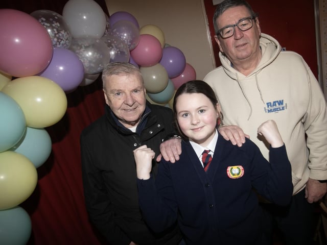 MY GRANDAS!. . . .P7 pupil Callie Moore pictued with her grandas Gerard Moore and Nucker Tierney on Wednesday. : .