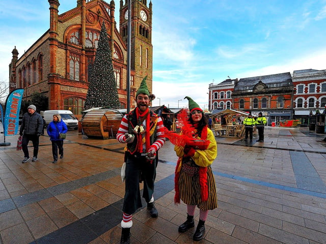Elves at Christmas Market in Guildhall Square on Friday afternoon.  Photo: George Sweeney. DER2250GS – 59