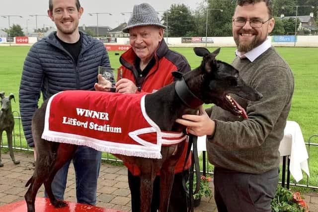Wilms Blake who won the Fitzwilliam A1/A2 525yards final at Lifford. Peter Farrell, on behalf of the sponsors, made the presentation to winning owner Tom Caughey (centre_ with Paul Murphy (Racing Manager at Lifford Track) on right.