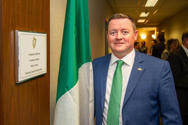 Derry man Mark Owens pictured at the opening of his new office.