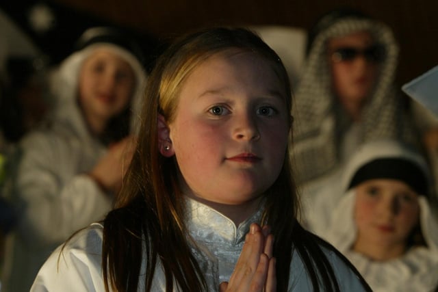 Emily Toland of Trench road PS, performing at the schools carol service. (1912JB01):Derry nativities and Christmas shows from December 2003